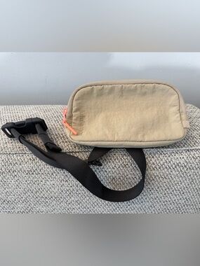 lululemon Beige Belt Bag with Coral Zipper Accent